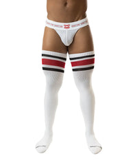 White mesh briefs paired with nasty pig hookd up thigh high red and black striped knee-high socks in front view