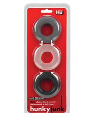 Set of three hunky junk silicone blend non-roll stacking cock or ball rings in gray translucent pink and black