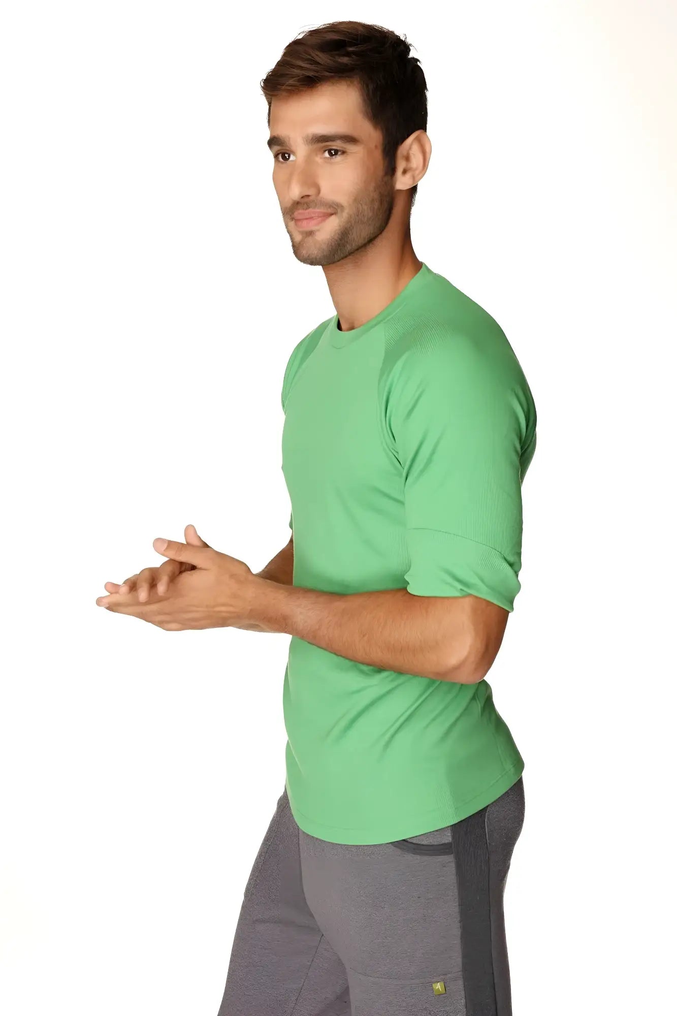 A vibrant bamboo green short-sleeved hybrid crew neck raglan tee made of soft cotton fabric