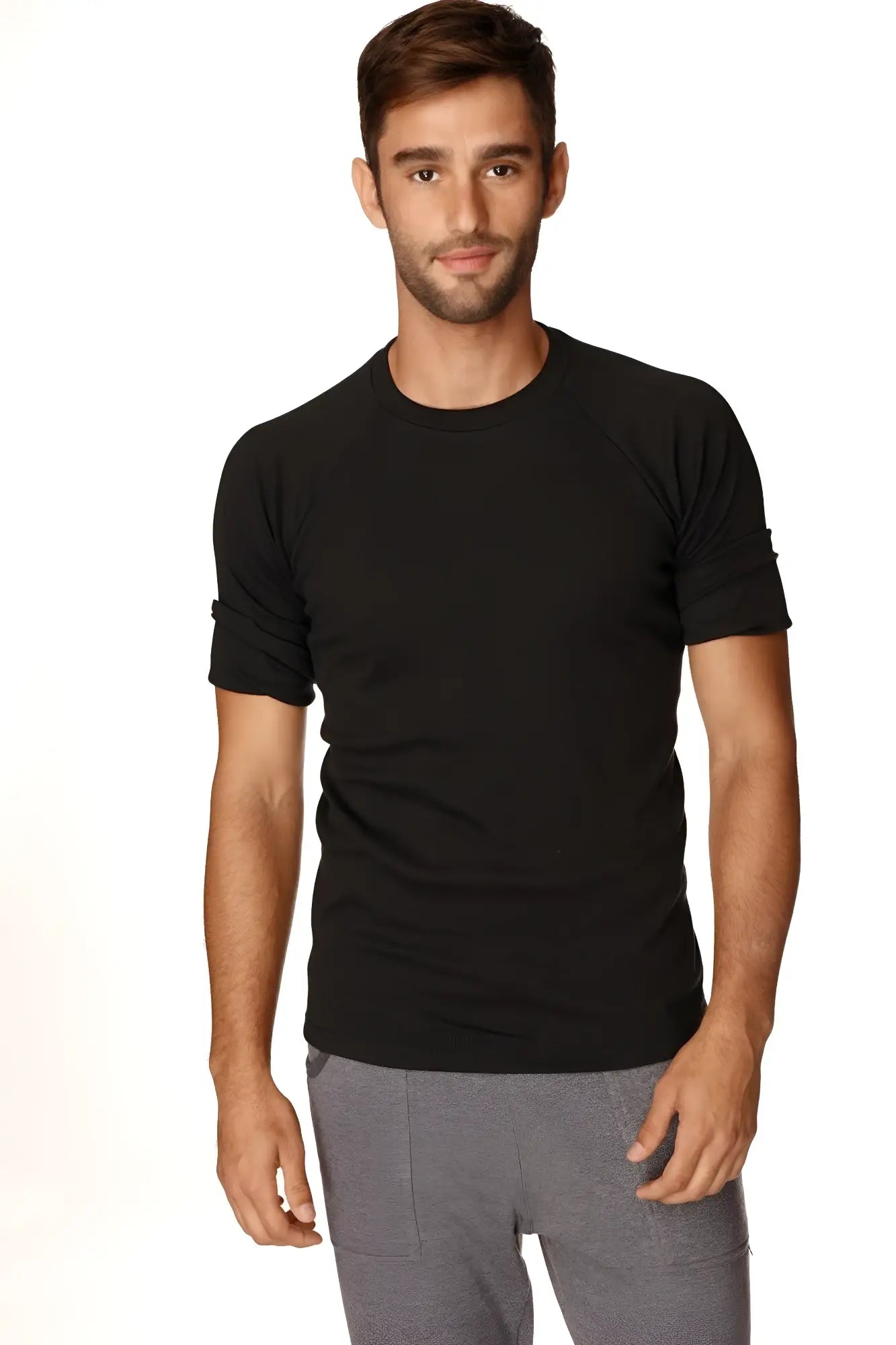 Black hybrid crew neck raglan tee with short rolled-up sleeves made of soft breathable fabric