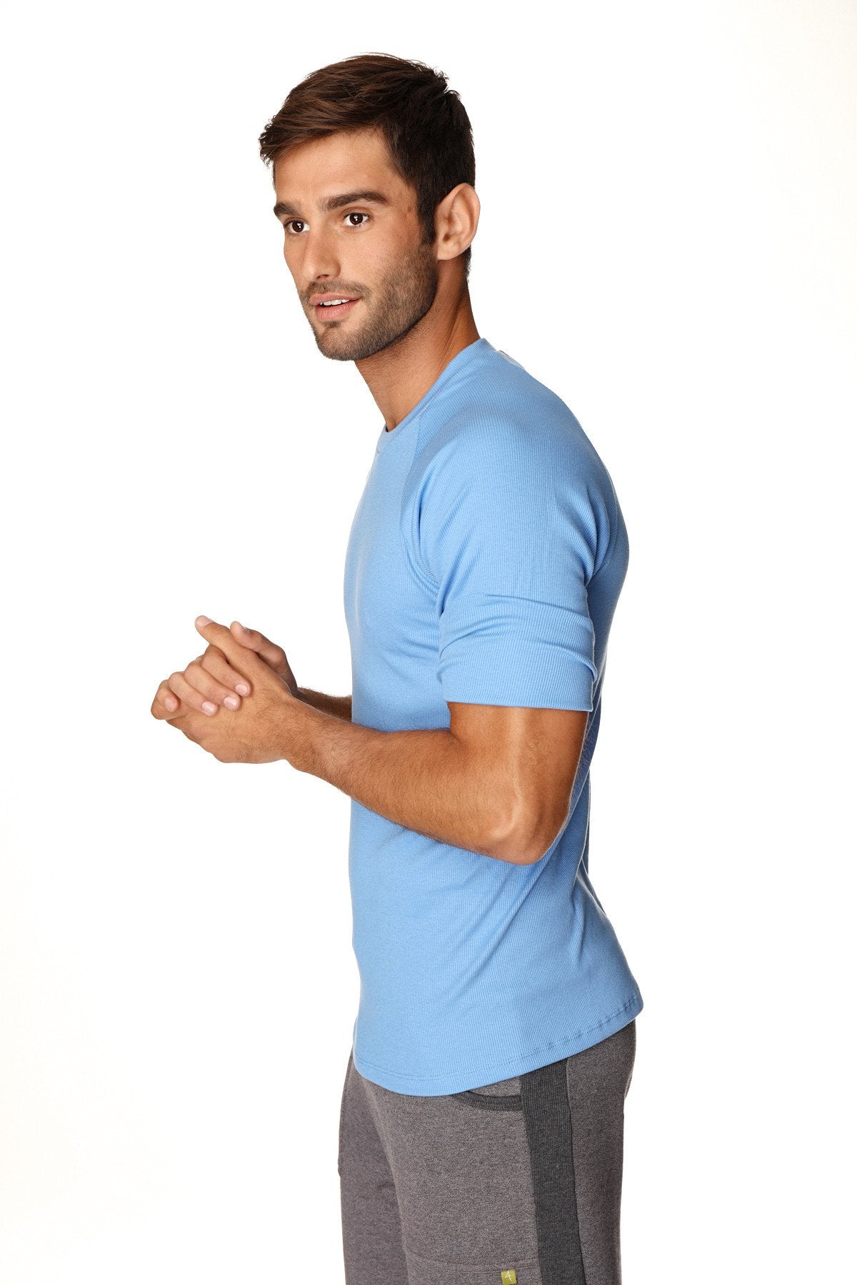 Light blue short-sleeved hybrid crew neck raglan athletic tee designed for comfort and performance