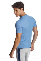Light blue hybrid v-neck short-sleeved athletic shirt with ribbed texture and subtle back seam detail shown from back