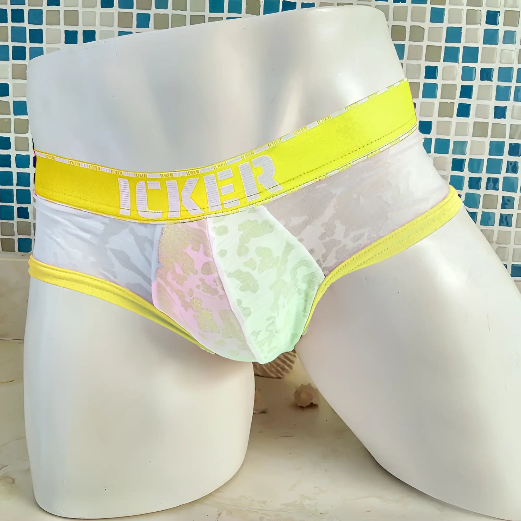 Icker sea acid mesh piping brief underwear in mango with bright yellow waistband and sheer white lace trim interior