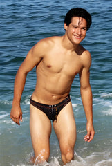 Black icker sea bikini swimwear trunks with white trim and drawstring closure for beach and swimwear use