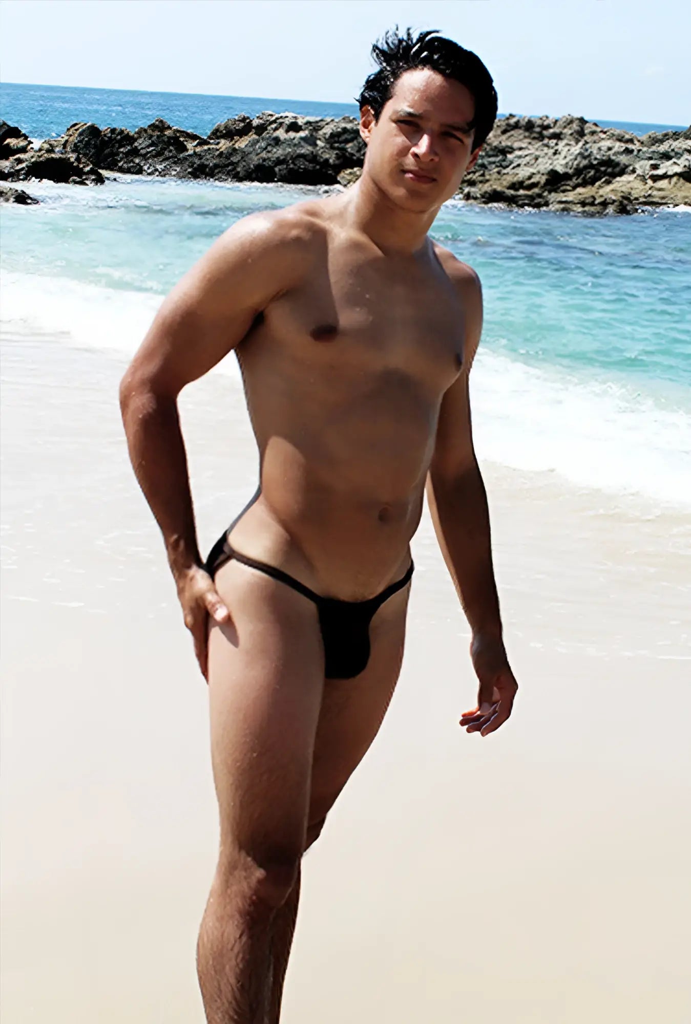 Black thong swimsuit with red contrast stitching micro slip tanga bikini swimwear by icker sea shown from back