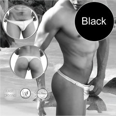 Black tanga thong swimwear by icker sea with white contrast stitching and textured waistband shown from the back