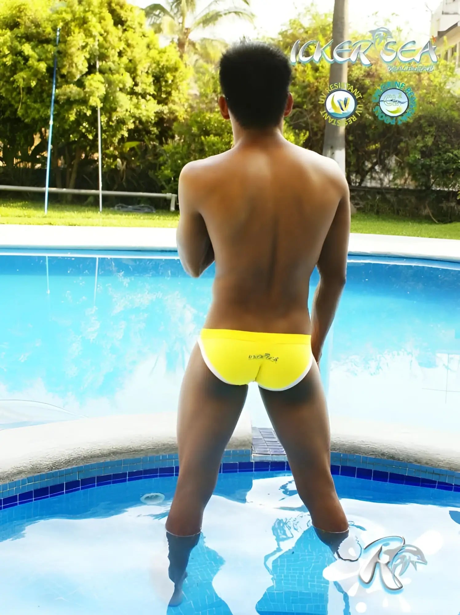 Back side of bright yellow kicker sea micro slip bikini swimwear with white trim and brand name print in mango white
