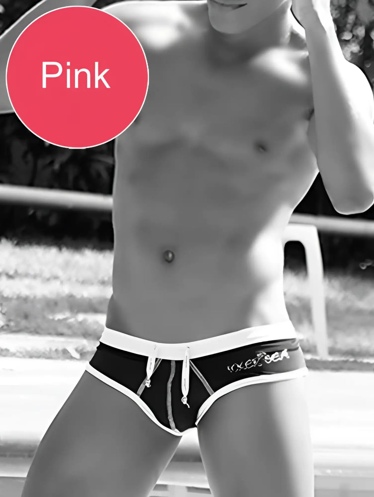 Pink swim trunks with white waistband and drawstring featuring vixen logo in icker sea cheeky mini bikini style