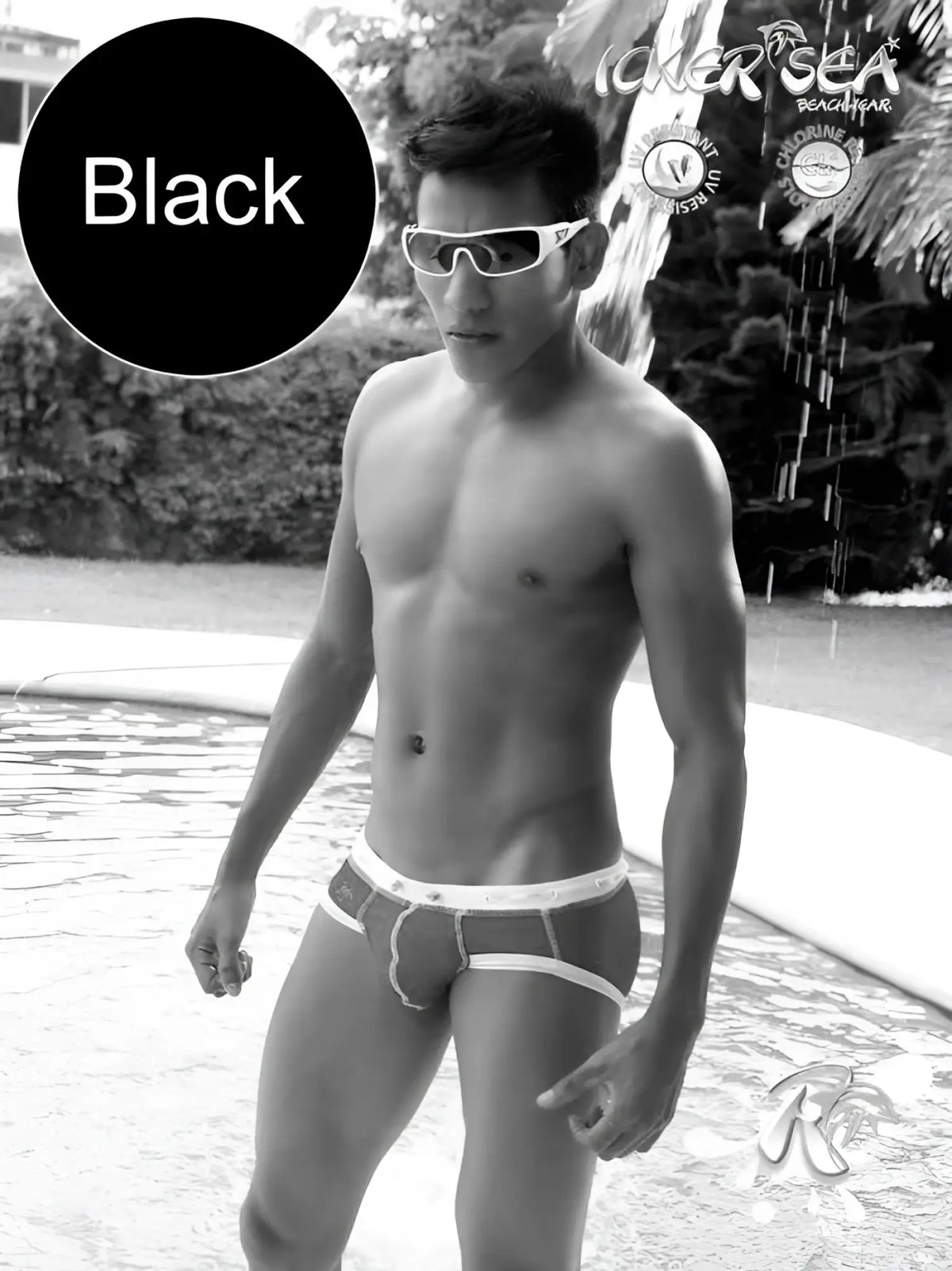 Black icker sea cord bikini swimwear trunks with white contrast trim stitching and subtle logo on waistband