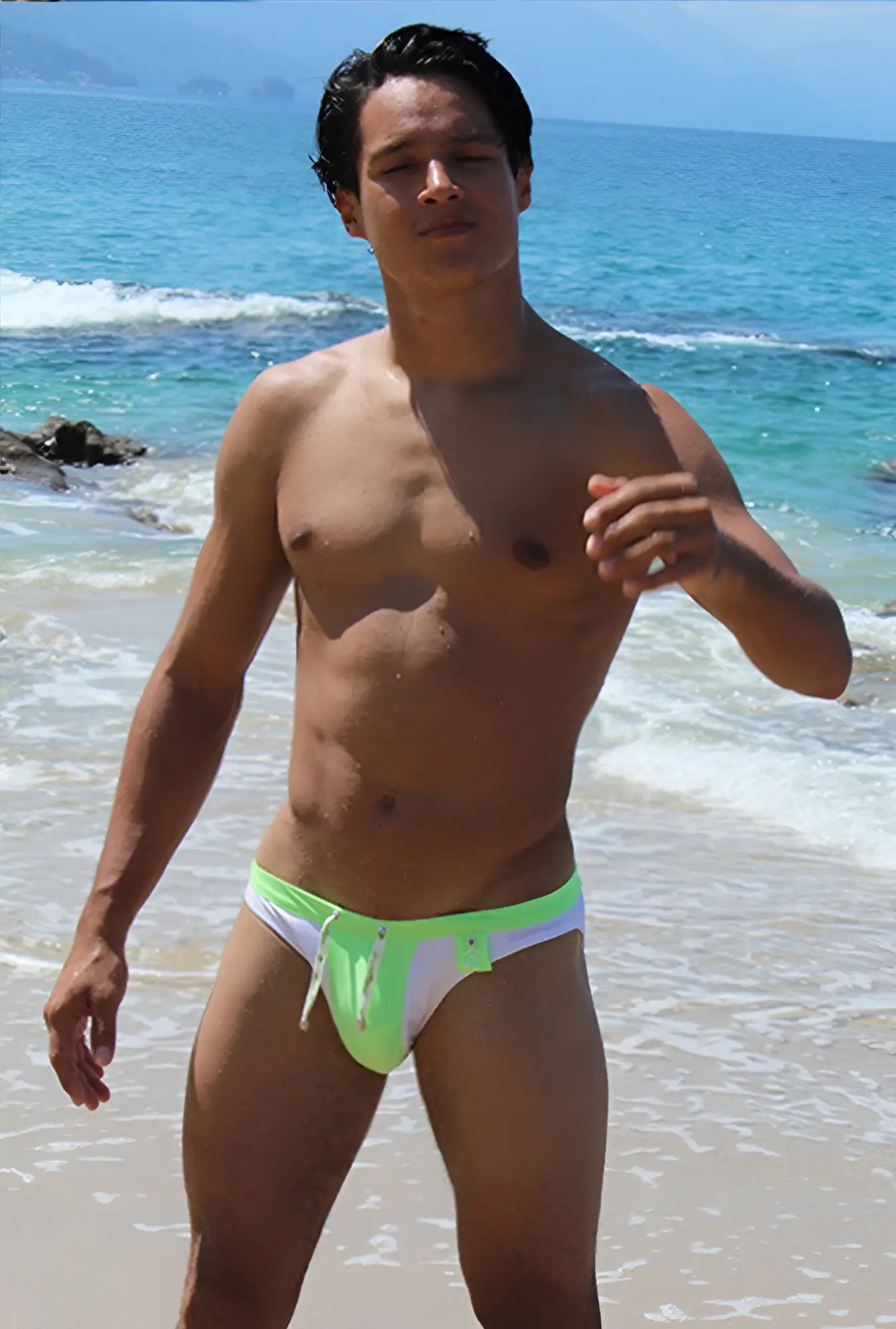 Bright neon green and white Icker Sea Duotone bikini swimwear with a distinctive cutout design swim trunks