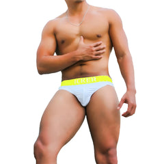 Light blue icker sea kiss my ass brief underwear with bright yellow waistband and black brand lettering mango COI-21-04