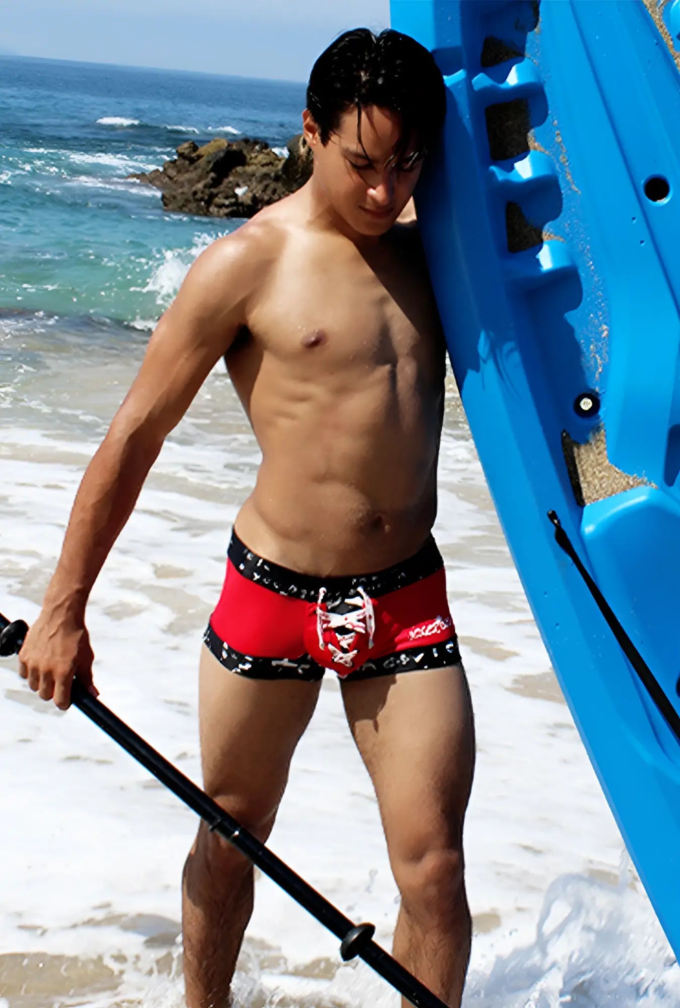 Icker Sea lace up contrast square cut trunk swimwear in red and black with white skull design on front