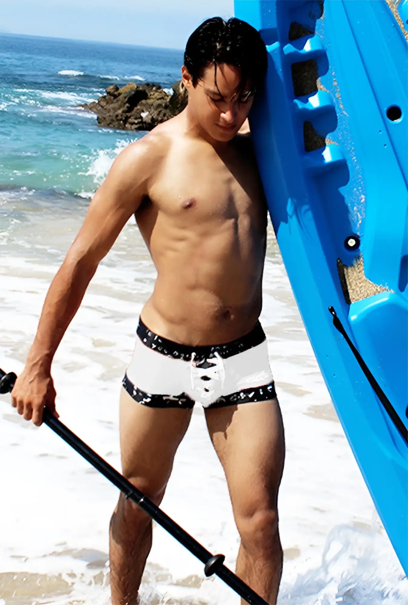 White icker sea lace up contrast square cut swim trunks with black lace detailing and patterned trim