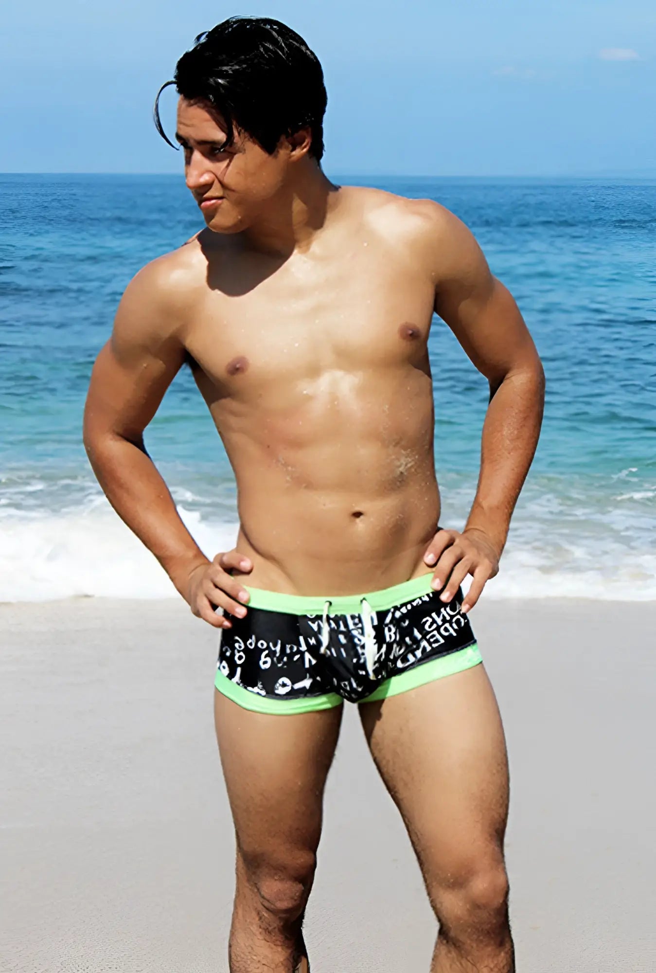 Icker Sea letters square cut trunk swimwear in black and neon green with white graphic print