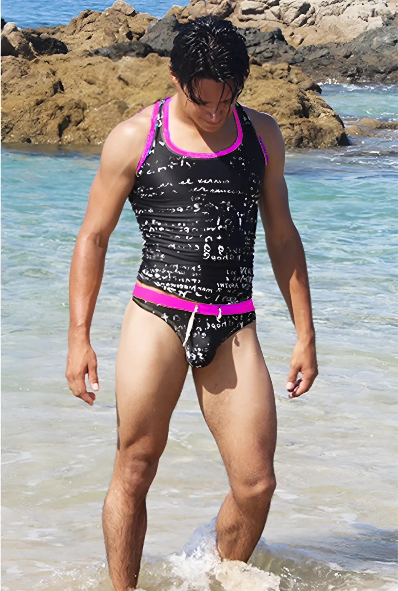 Black and bright pink swim trunks with a mathematical equation print from icker sea letters tank top t shirt collection