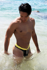 Icker Sea Letters thong swimwear black with bold yellow waistband and white drawstring for swim use