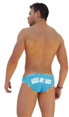 Back side of icker sea blue slip bikini underwear featuring bright swim trunks with white kiss my ass text