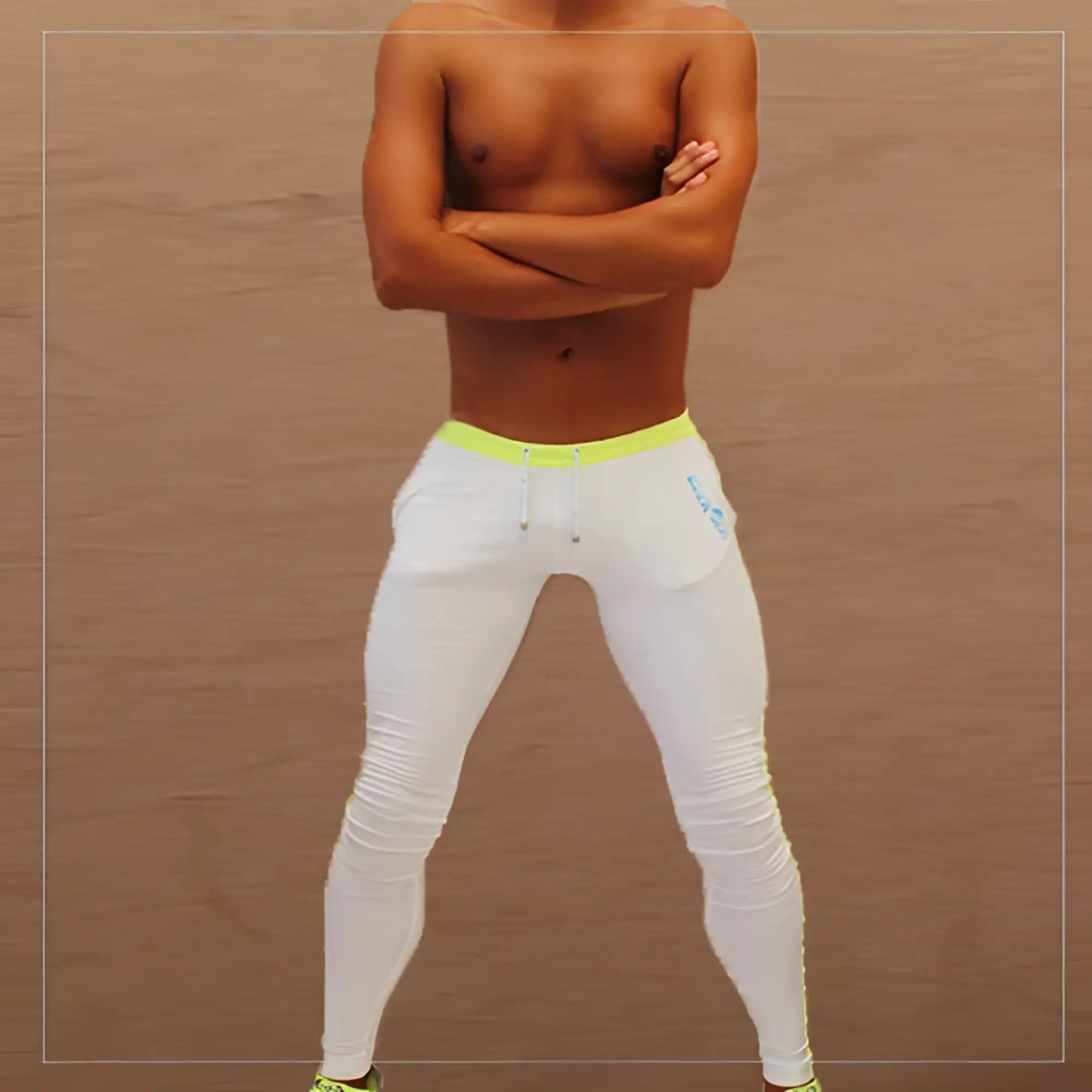 Icker Sea Side Stripe runner pants white with bright neon yellow waistband and subtle blue logo on the thigh