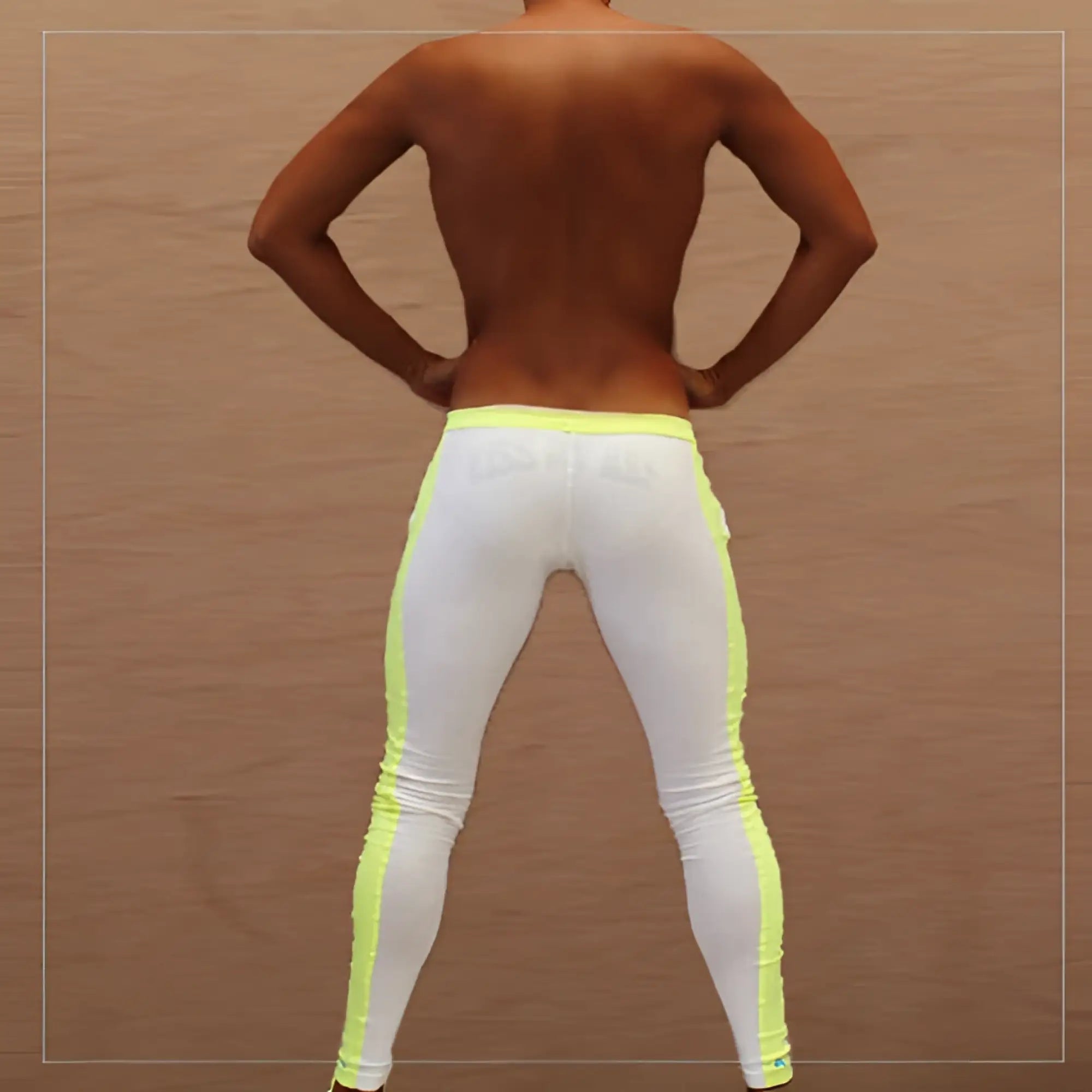 White icker sea side stripe runner pants with bright neon yellow side stripes designed for activewear use