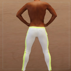 White icker sea side stripe runner pants with bright neon yellow side stripes designed for activewear use