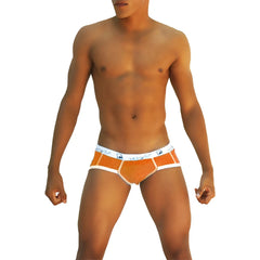 Orange textured brief underwear with white trim and blue Icker Sea logo on waistband COI-13-14 front view