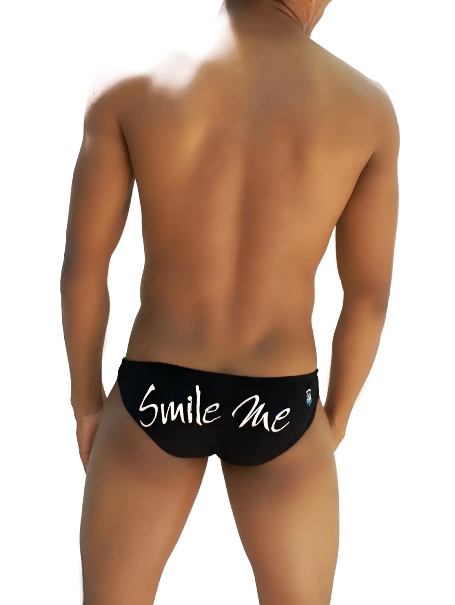 Back view of black icker sea smile me slip bikini underwear with white smile me text across the swim trunks