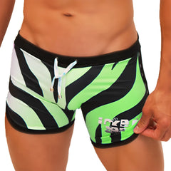 Vibrant neon green and black zebra-striped Icker Sea open side suspender scalloped swim trunks with white drawstring