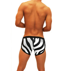 Icker Sea zebra open side suspender scalloped shorts swimwear in black and white zebra stripe with a sleek fitted design
