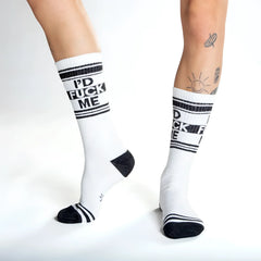 White crew socks with black text reading id fuck me and matching black stripes toe caps and heel accents