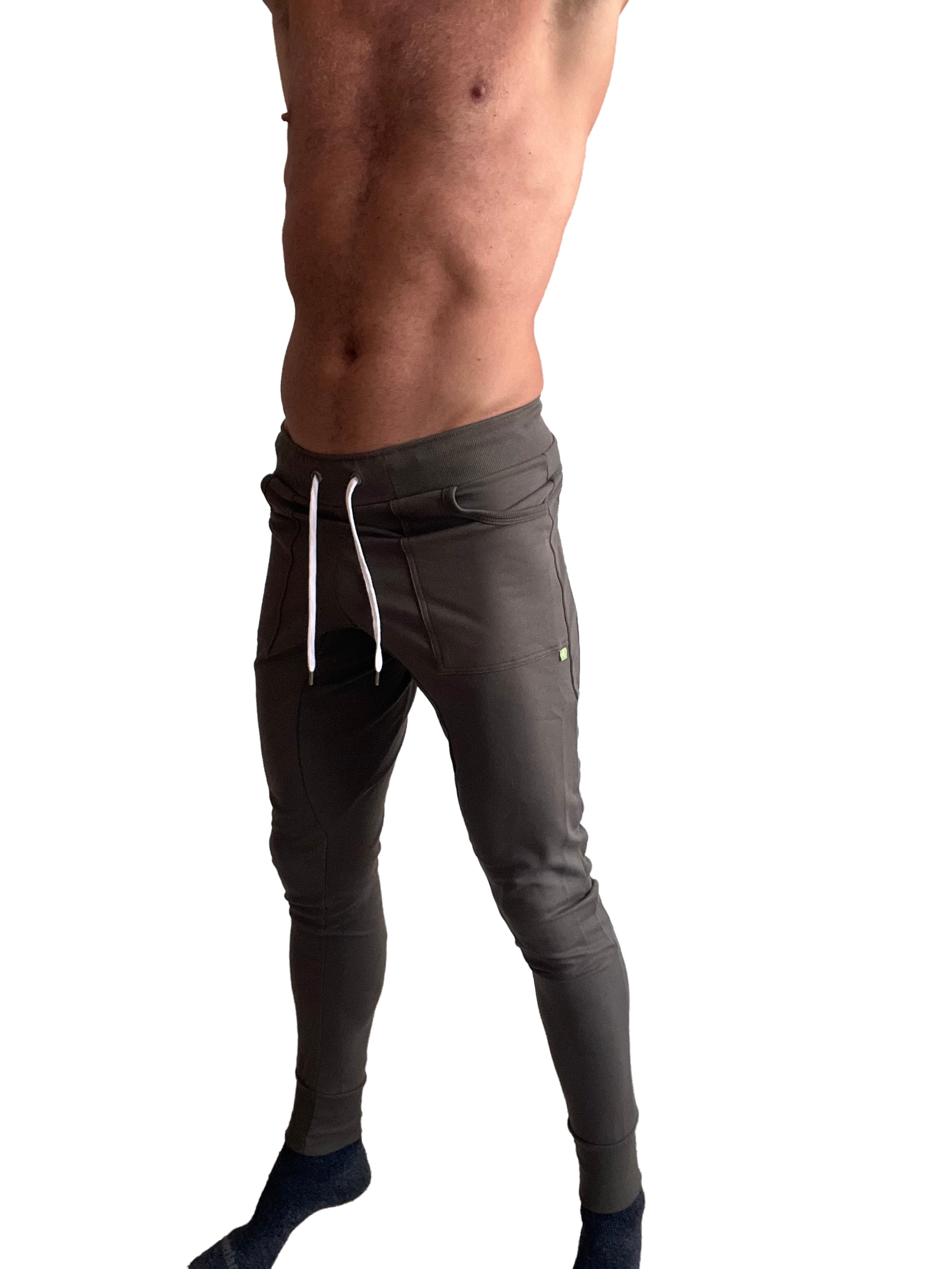 Dark gray long cuffed jogger and yoga sweat pants with white drawstrings and subtle side pocket detail