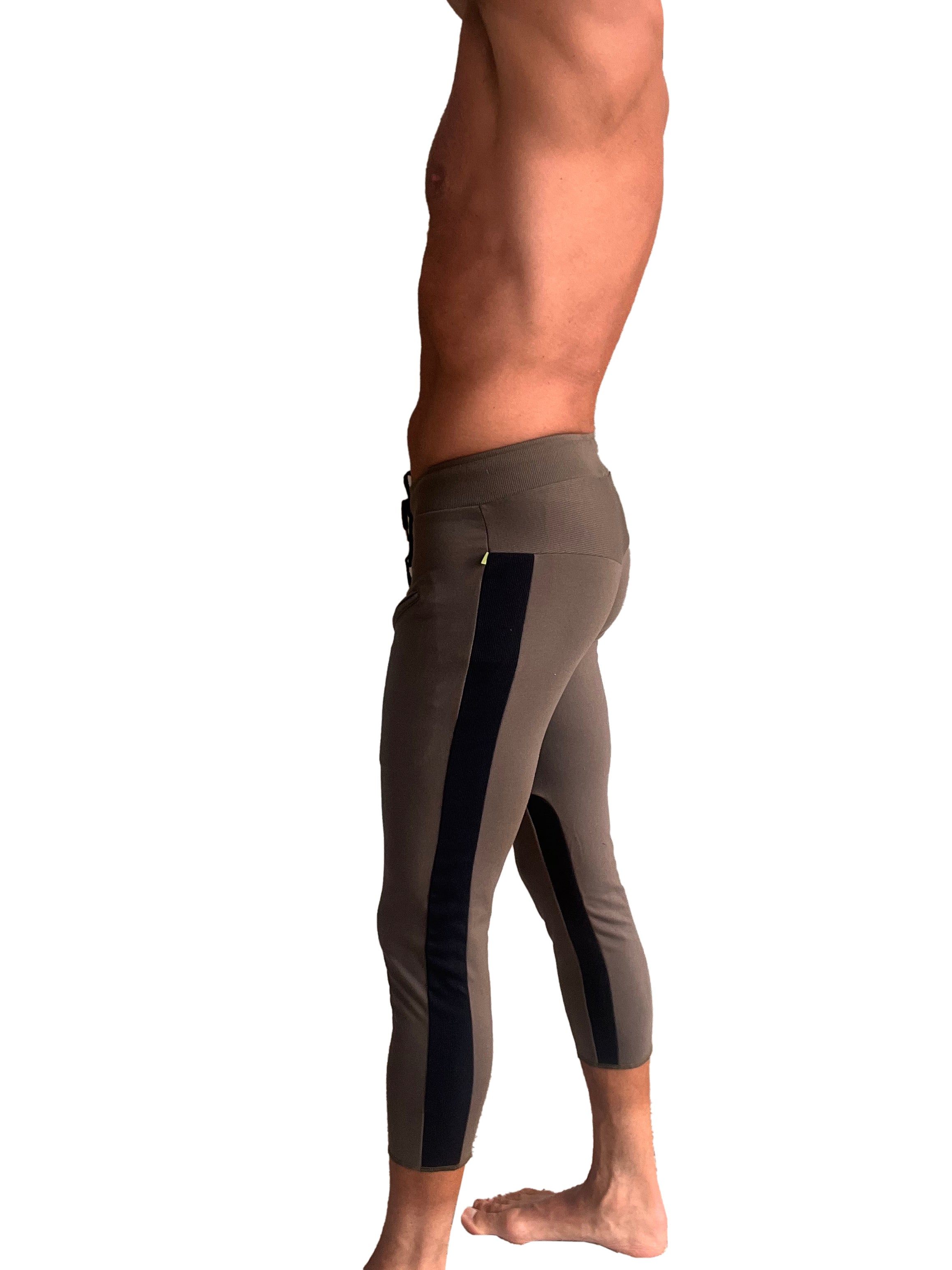 Mens 4/5 zipper pocket capri yoga pants in army green with black stripes and a high-waisted design
