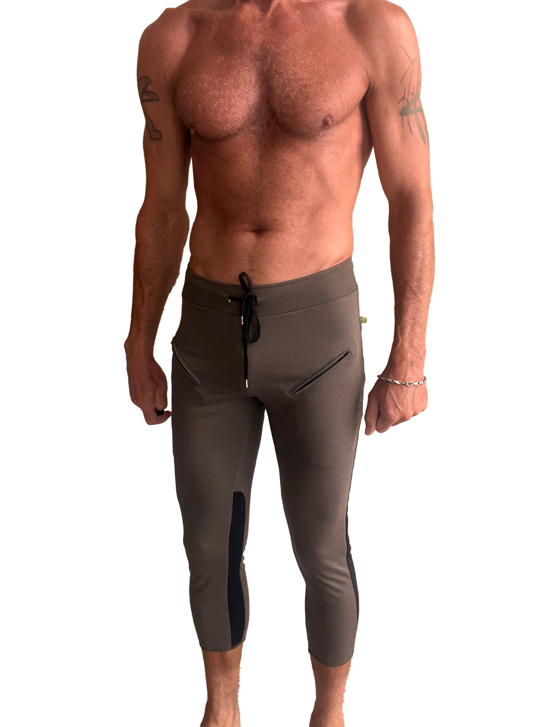 Mens olive green athletic capri yoga pants with black side panels and drawstring waistband for workout use