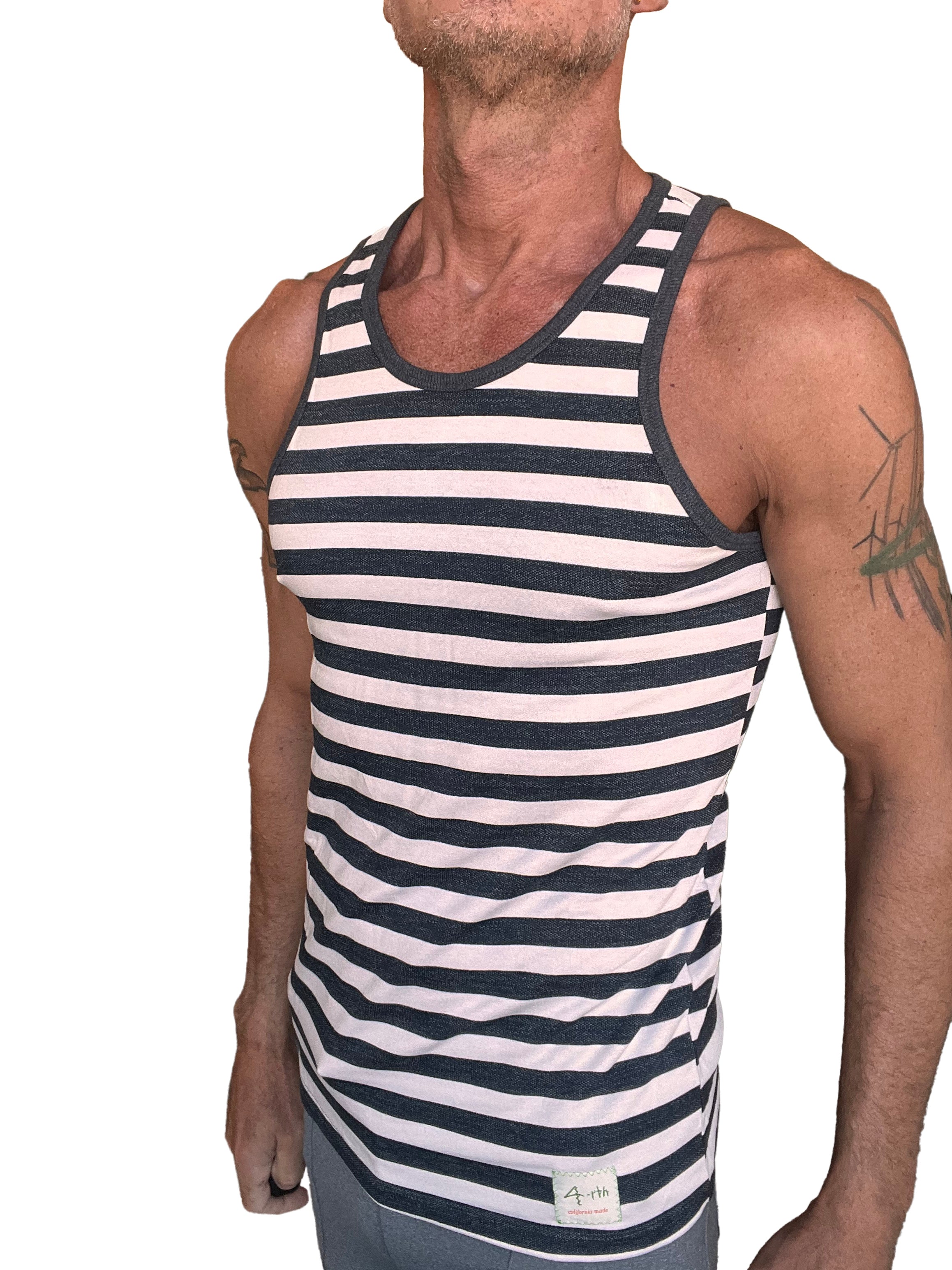 Yummy nautical fleece sustain tank top in black and white stripe with ribbed neckline and small brand tag at hem