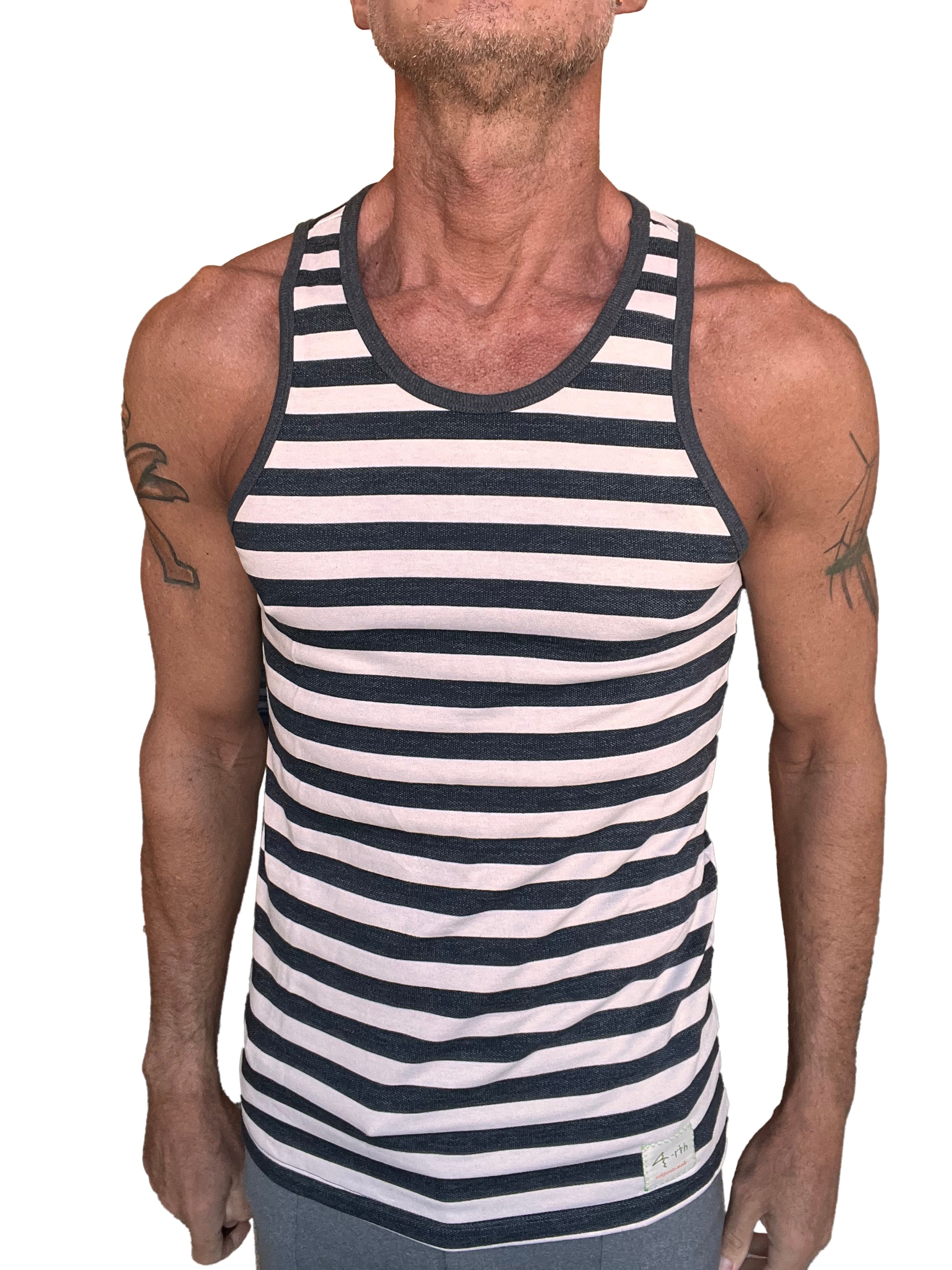 Yummy nautical fleece sustain tank top in black and white stripe featuring ribbed neckline and armholes