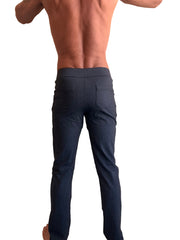 Dark blue slim-fit performance tactical urban dress pants with subtle textured fabric and two rear pockets back view