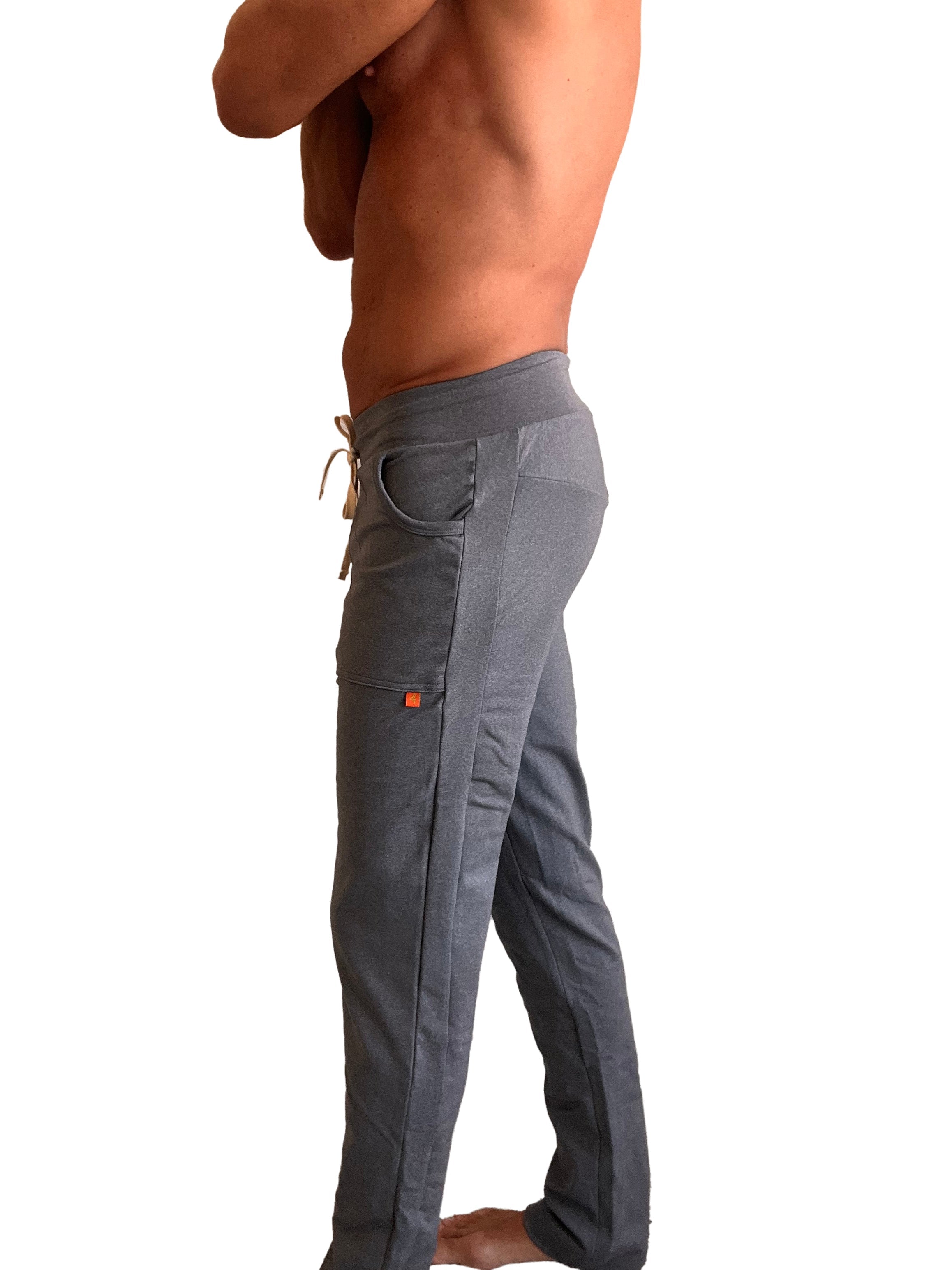 Performance premium track and lounge sweat pant in dark heather grey with drawstring waistband multiple pockets and orange tag