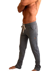 Performance premium track and lounge sweat pant in dark heather grey with drawstring waist and orange brand tag on thigh