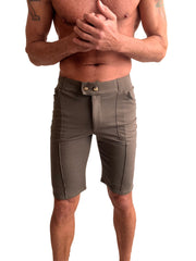Urban tactical at home dress shorts in army green featuring tailored khaki fabric and gold toned button accents