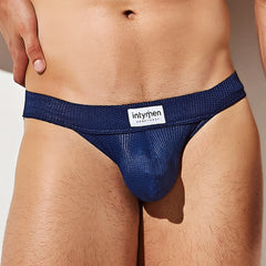 Deep blue mesh briefs with a white intymen brand label on the waistband from intymen ink014 thong collection