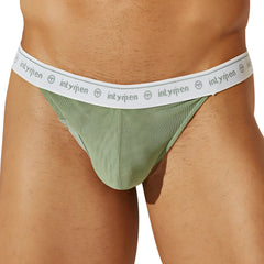 Mint green mesh briefs with white elastic waistband featuring intymen logo and emblem in intymen INK016 thong