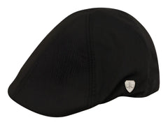 Black ivy cap with subtle texture and small silver shield emblem on the side made from soft fabric