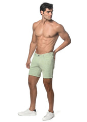 Light green jacquard printed stretch knit shorts with a subtle geometric pattern in textured fabric
