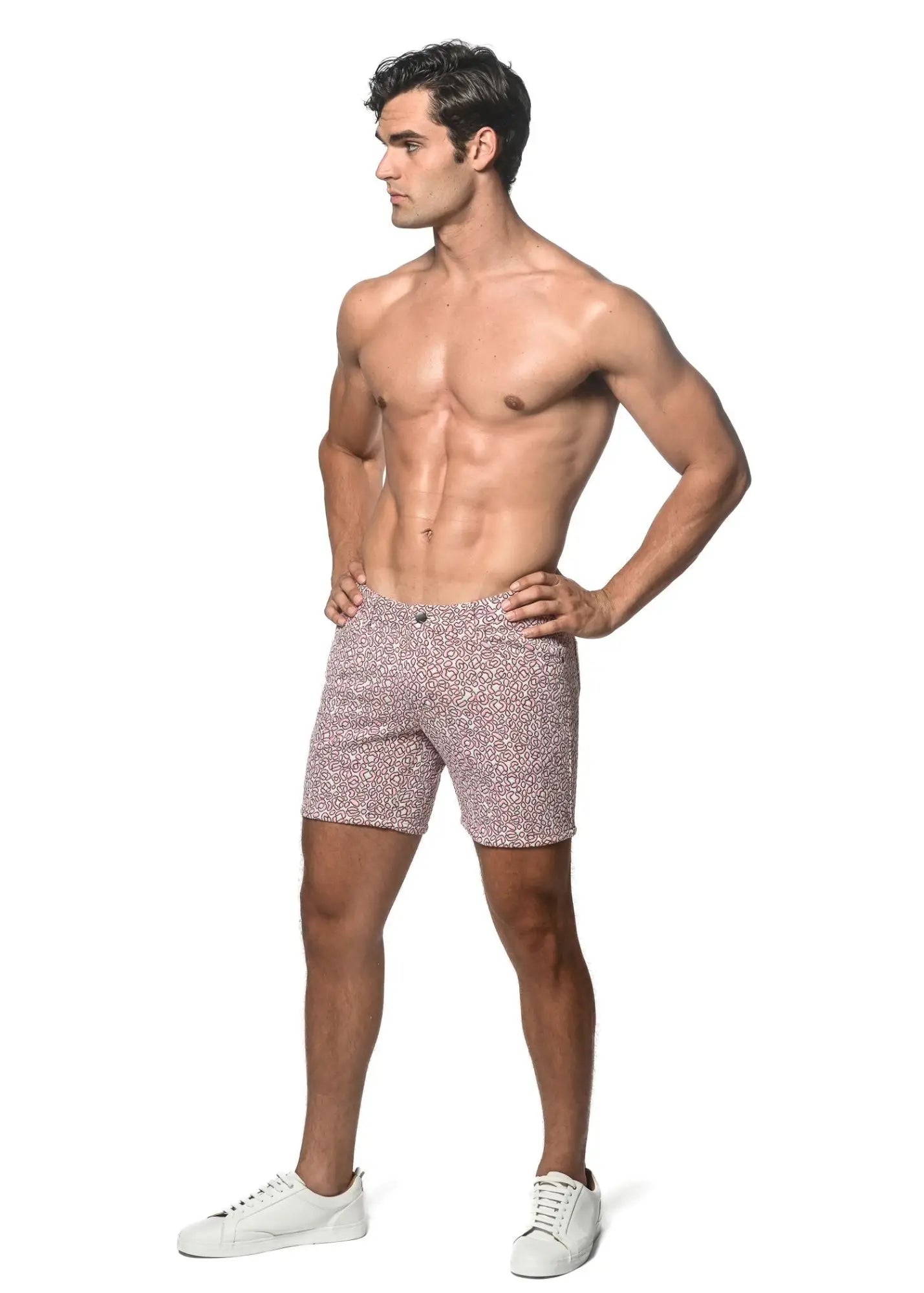 Patterned pink jacquard printed stretch knit shorts with subtle speckled design for comfortable wear