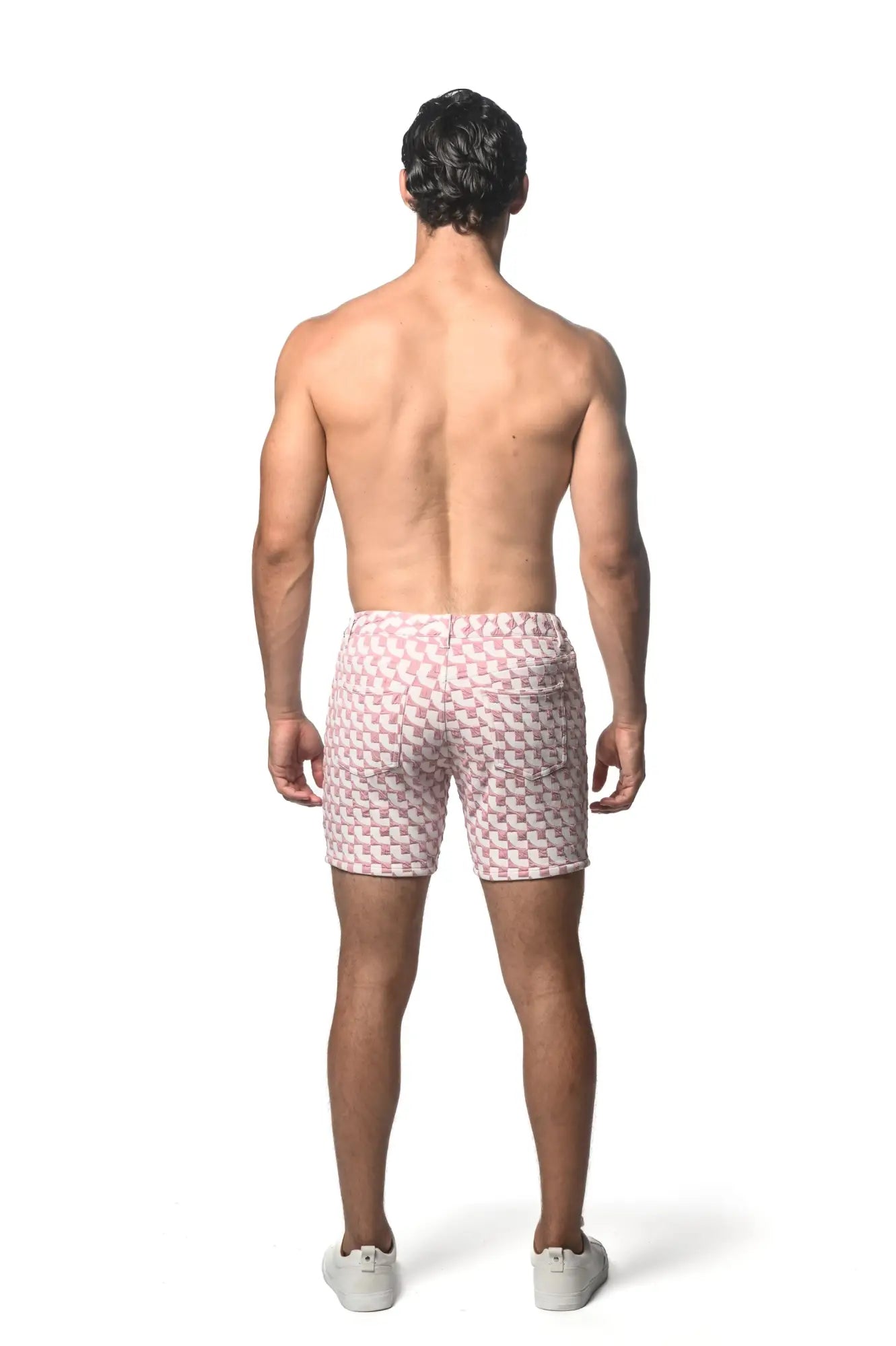 Pink and white jacquard printed stretch knit short swim trunks with geometric pattern for casual wear