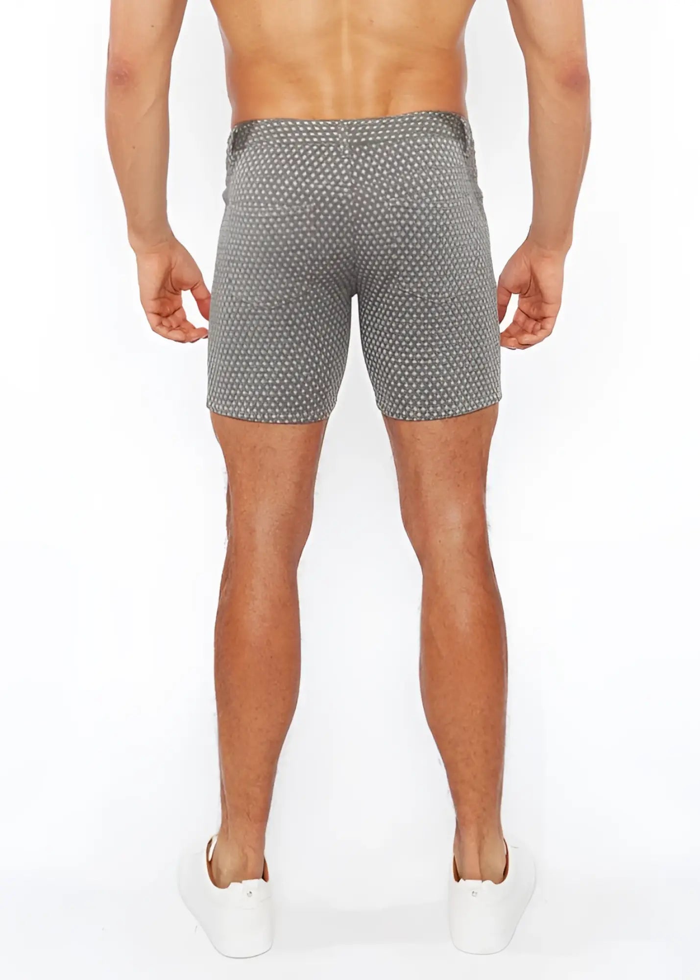 Gray jacquard stretch knit chino shorts with a subtle white polka dot pattern made from lightweight fabric
