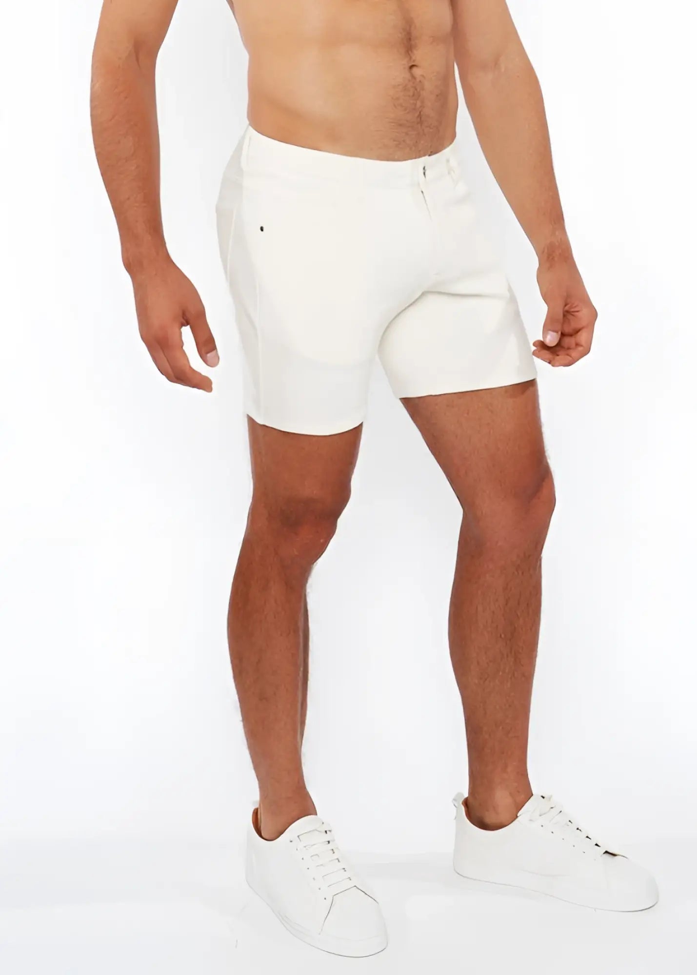 White jaquard stretch knit chino shorts with a sleek form-fitting design and subtle stitching details