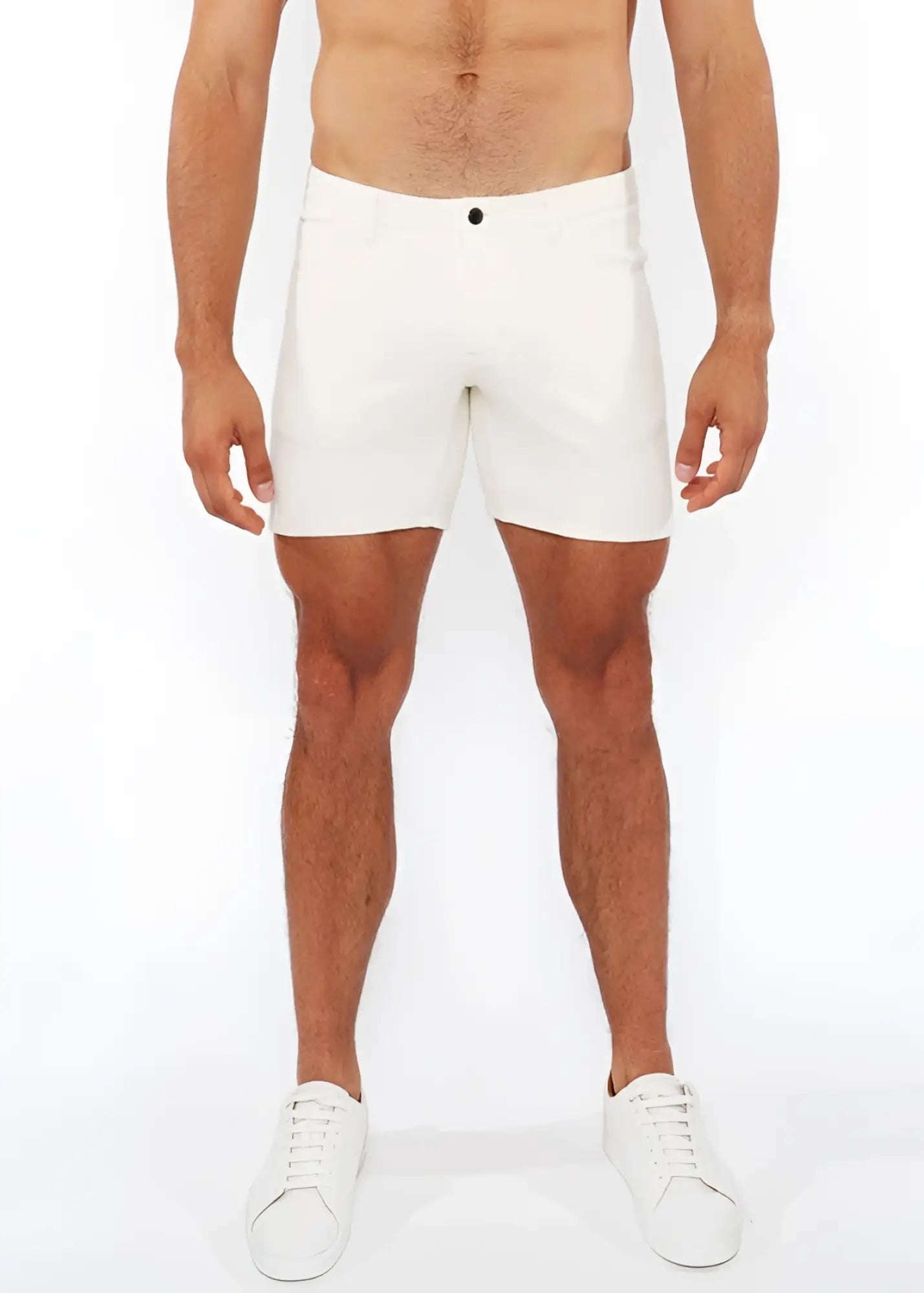 White jaquard stretch knit chino shorts with sleek form-fitting design and single black button at the waistband