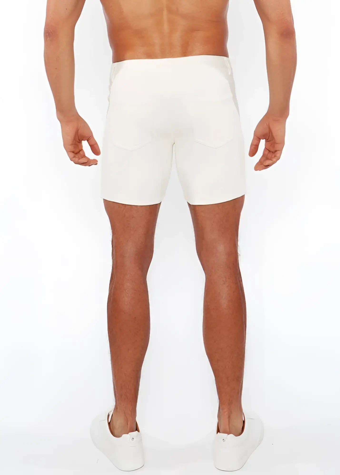 White jaquard stretch knit chino shorts with sleek form-fitting design and subtle stitching details