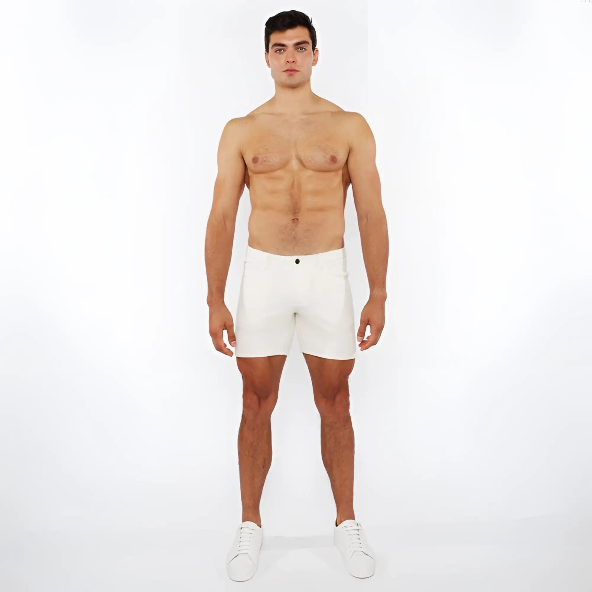 White jaquard stretch knit chino shorts with sleek minimalist design and a single black button at the waistband