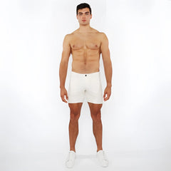 White jaquard stretch knit chino shorts with sleek minimalist design and a single black button at the waistband